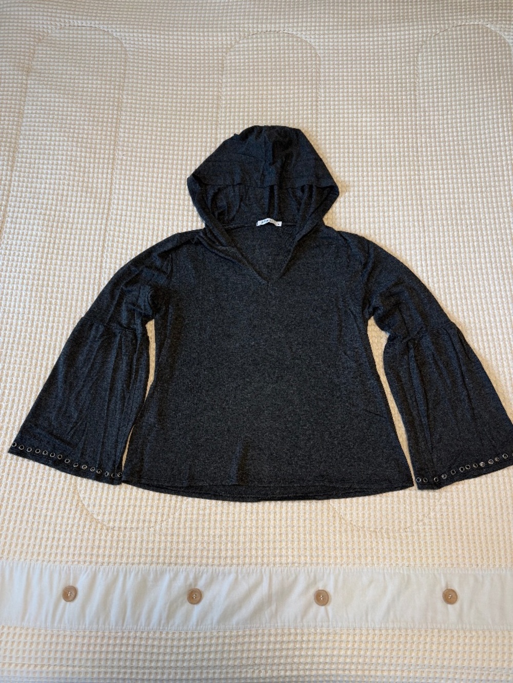 grey light weight hoodie with grommet detail on sleeves, large